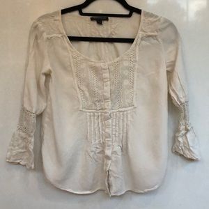 Cream top with buttoned up front